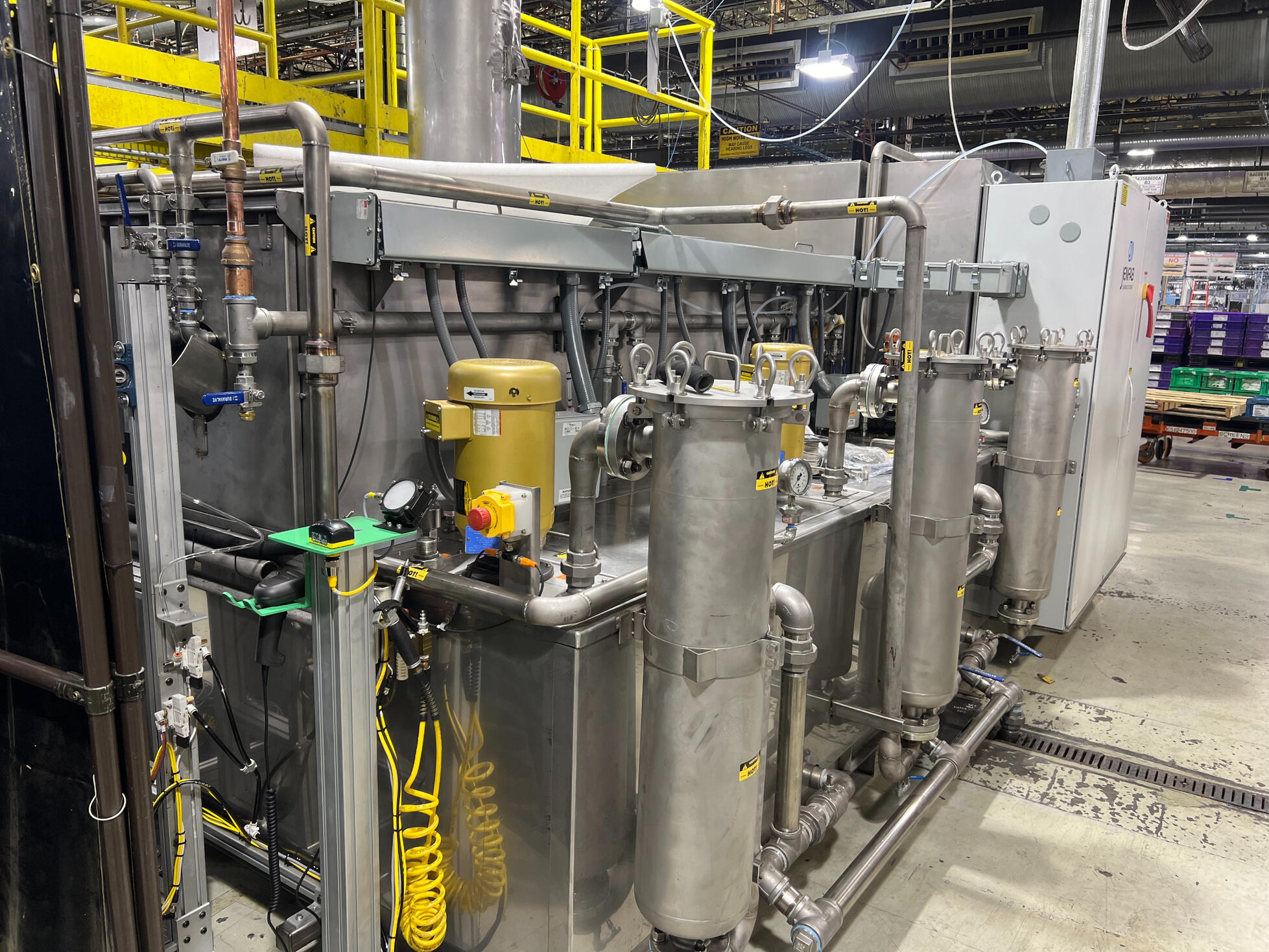 Industrial building interior with exposed trench and PVC piping installed by Deseret Peak Piping